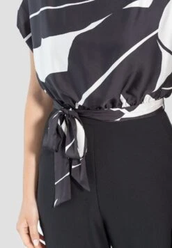 SWING Bedrucktem - Jumpsuit - Black Ivory -Mode Jurk Winkel 50ed9444e83342e19c55a9e74241d703