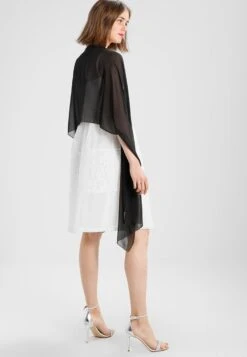 SWING Poncho - Schwarz -Mode Jurk Winkel f264bc6dc84e4fd0a2b38a131f5c8a54